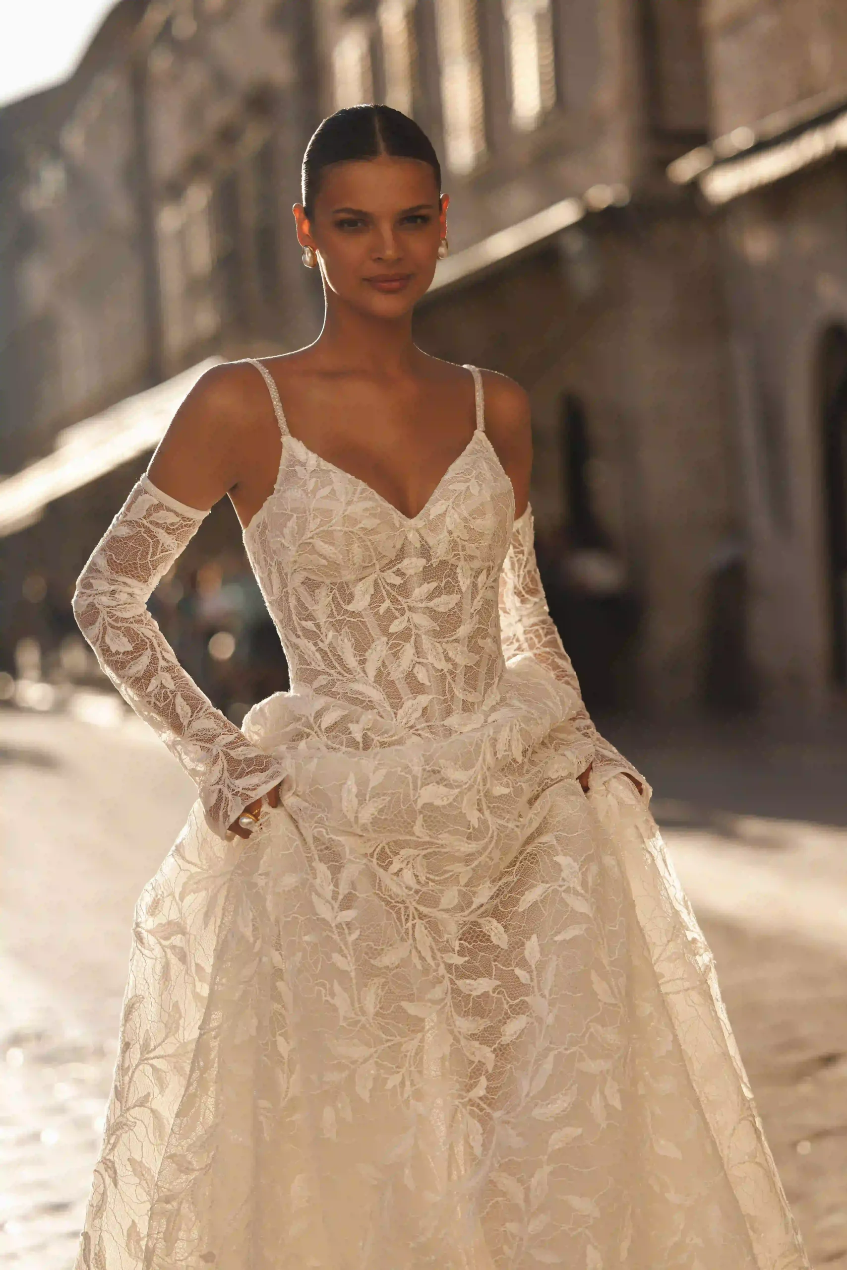 Close front view of Esme from the Lana Grace bridal collection during a wedding dress fitting experience