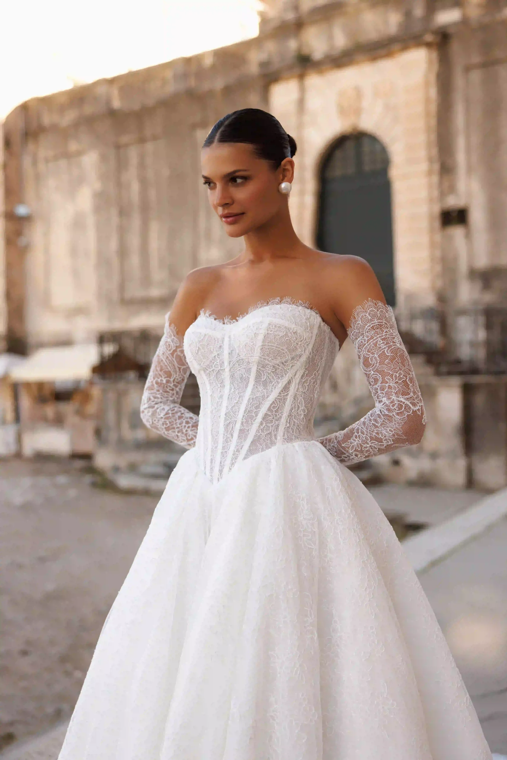Close front view of Fiona from the Lana Grace bridal collection during a wedding dress fitting experience