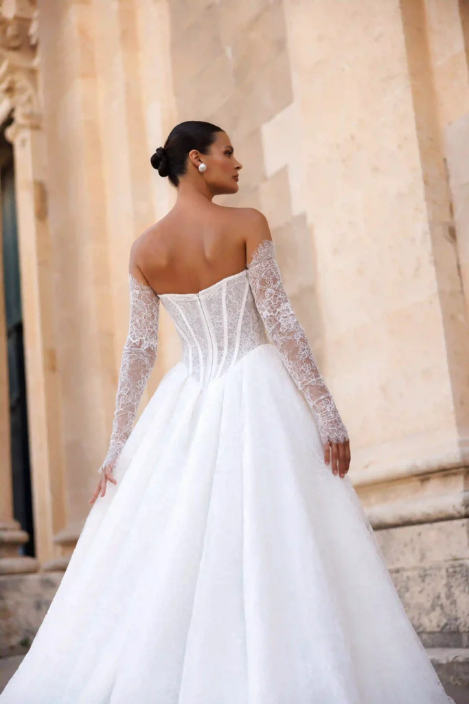 Close back view of Fiona from the Lana Grace wedding dresses collection during a wedding dress fitting experience